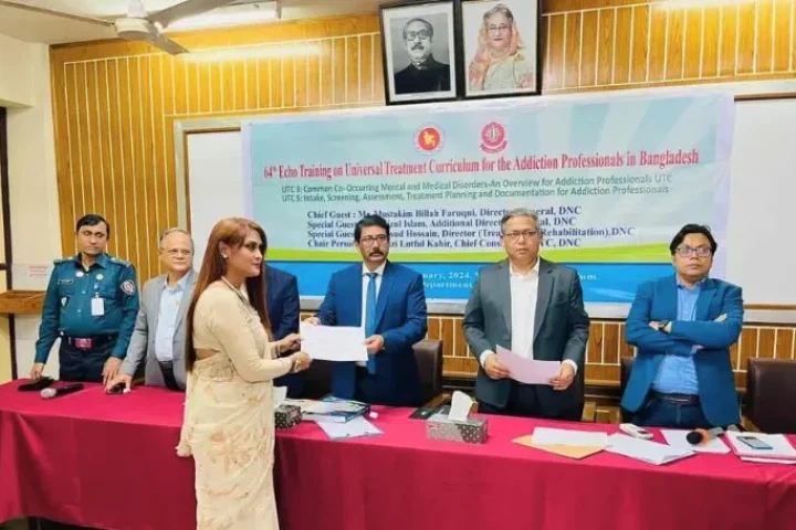 Golden Life BD receiving a certificate from the Department of Narcotics Control, Dhaka